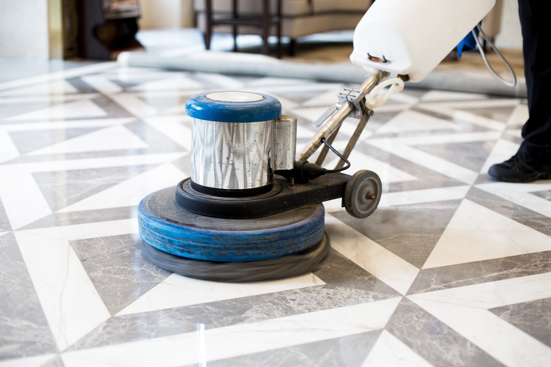  polishing marble floor in modern office building